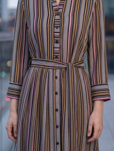 Outfit detail of Sunavyaa black georgette midi dress with Sunavyaa cufflink — Saturn Number 8 energised wrist anchor — sacred manifestation system