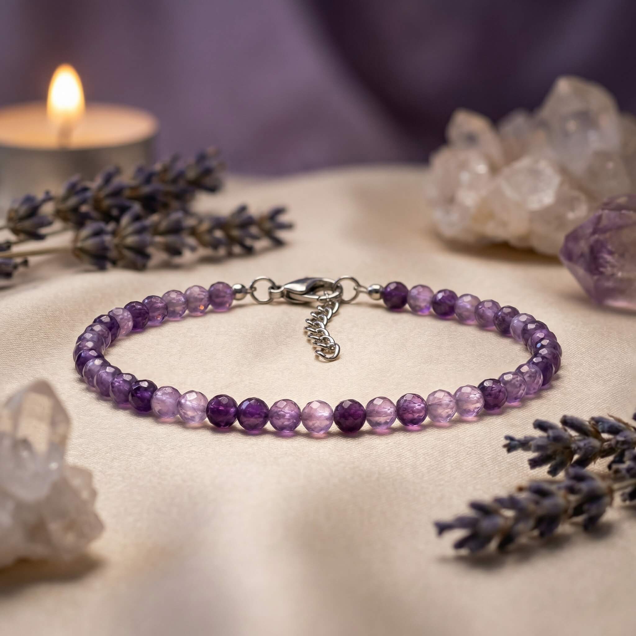 Sunavyaa amethyst crystal anklet flat lay with raw amethyst stone on white plaster surface