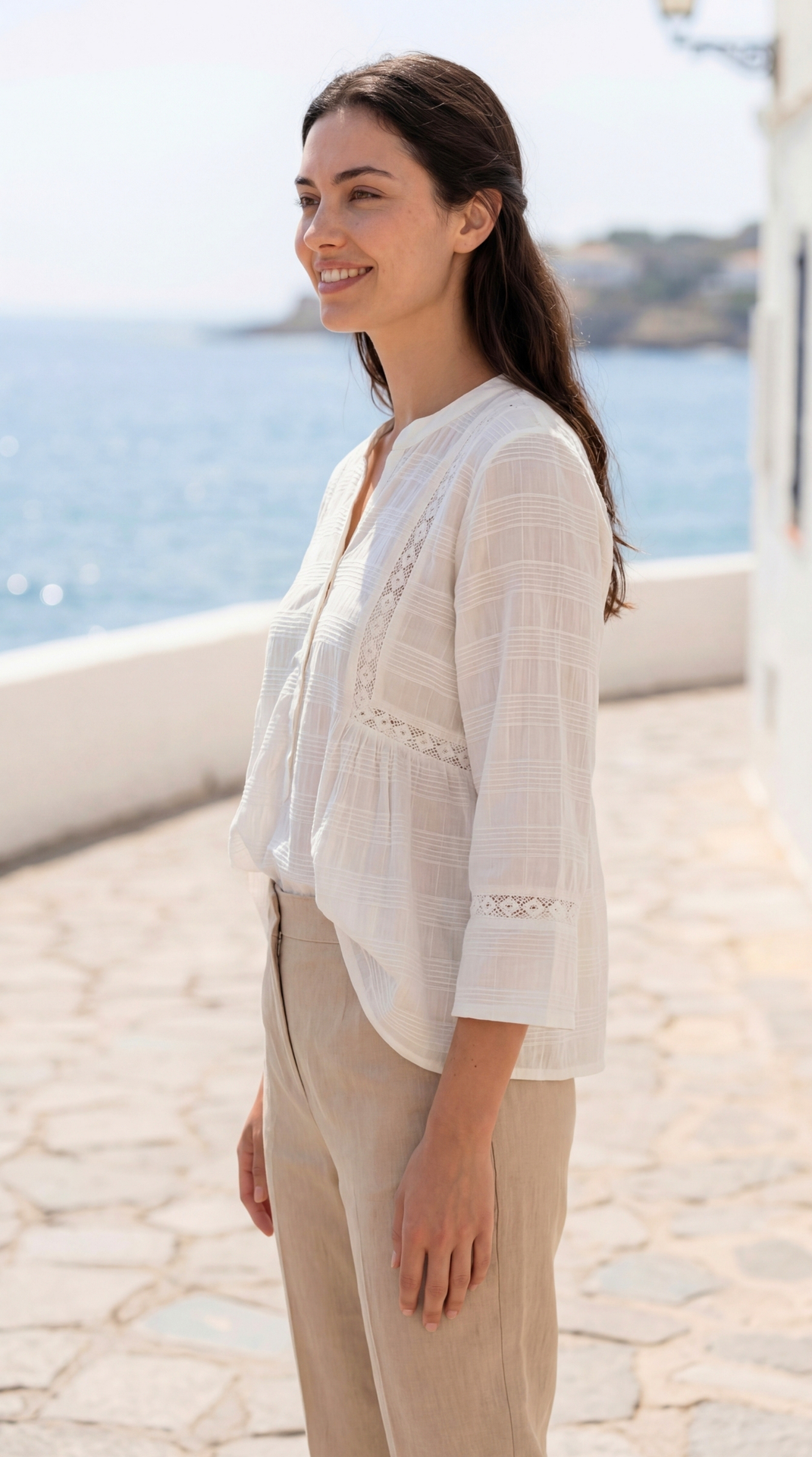 Side view of Sunavyaa white crush cotton top showing princess line seams and side waist gathers — emotional expansion design detail